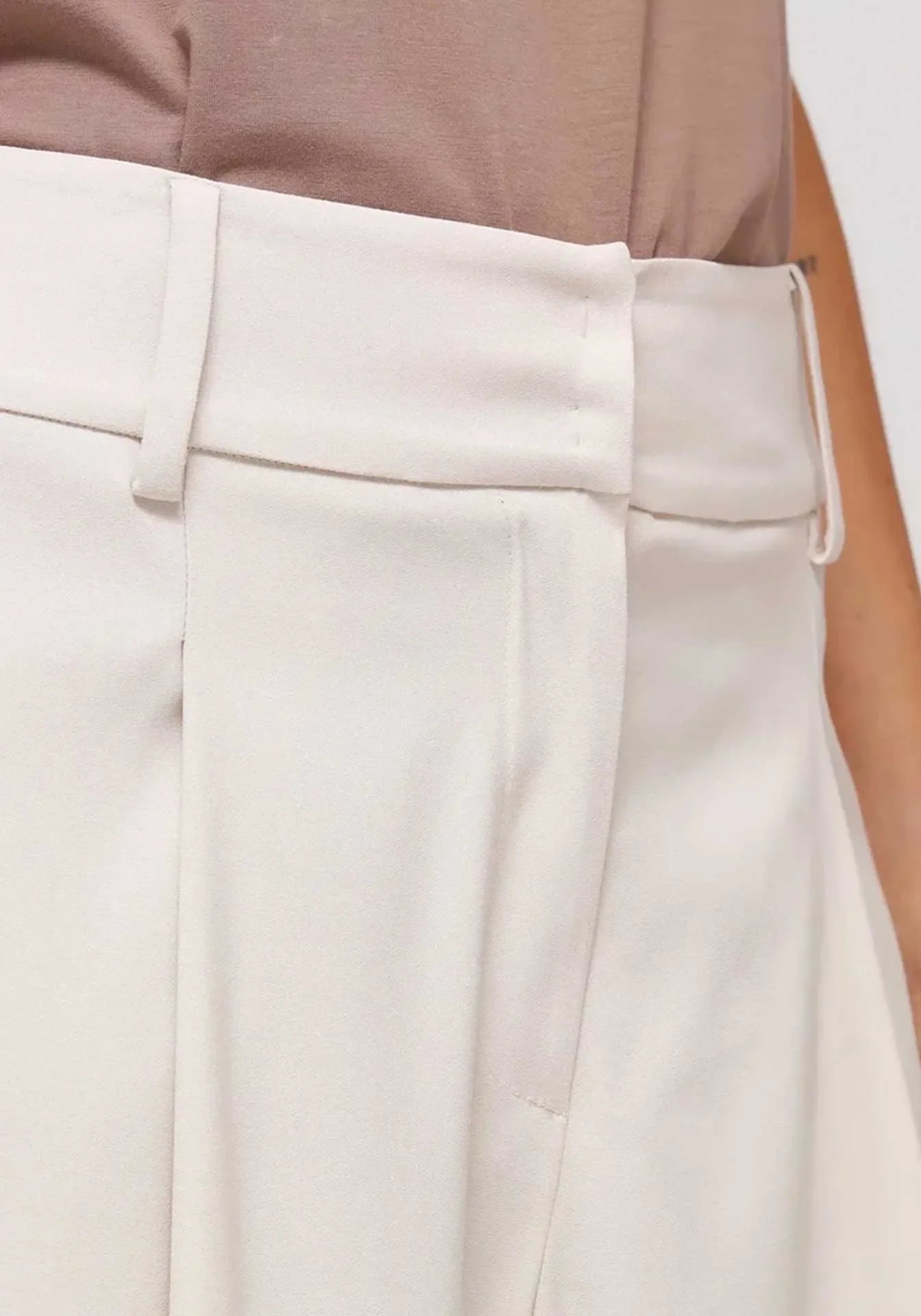 Details on palazzo pants that make a difference. All hand Meda in Italy.