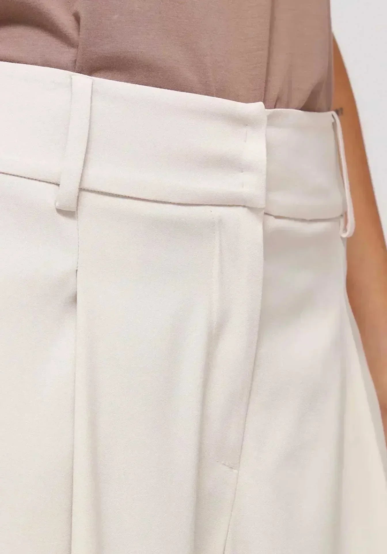 Details on palazzo pants that make a difference. All hand Meda in Italy.