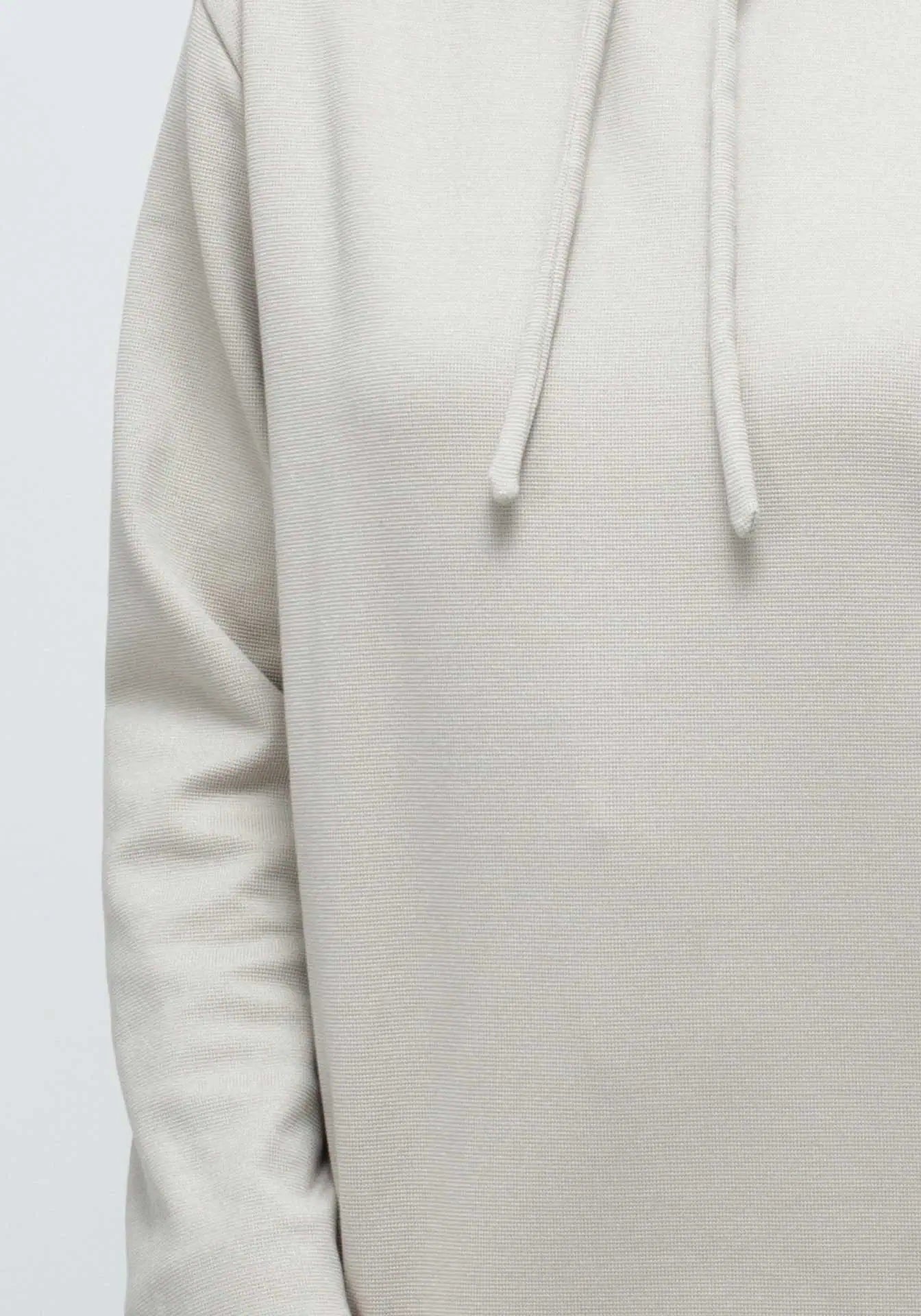 Close up of a punto Milano (Milano stitch) hoodie in beige from Humans & Land