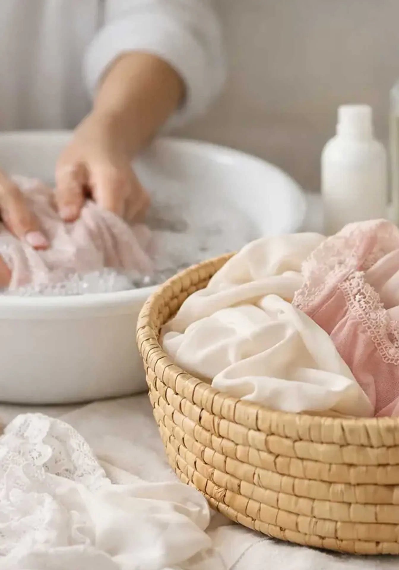 Woman's hands washing clothes in a delicate manner